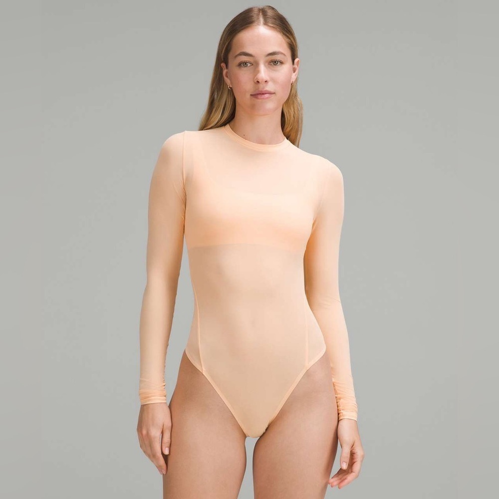 Lululemon Wundermost Nulu Mesh Long-Sleeve Crewneck Bodysuit
Peach Bellini